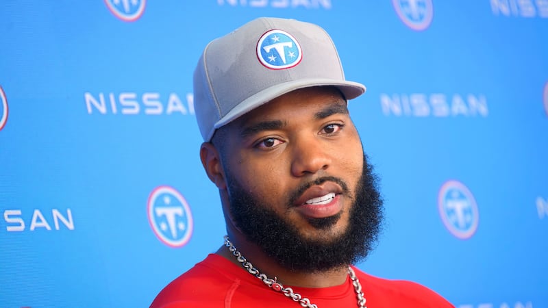Tennessee Titans defensive tackle Jeffery Simmons speaks to the media after NFL football...