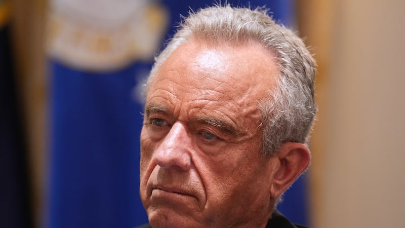 FILE - Secretary of Health and Human Services Robert F. Kennedy Jr., listens during a Cabinet...