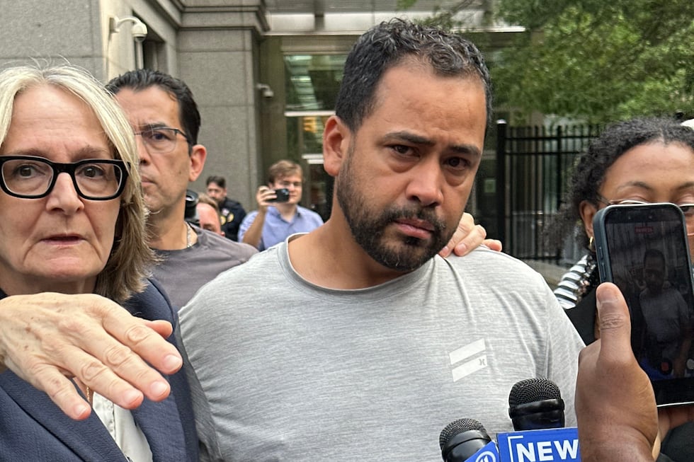 Manuel Hernandez leaves U.S. district court in Manhattan with his lawyer, Amy Gallicchio, on...